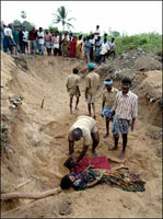 A mass grave under preparation