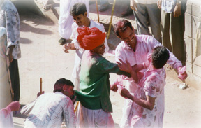 Applying gulal (coloured powder) as part of Holi celebration